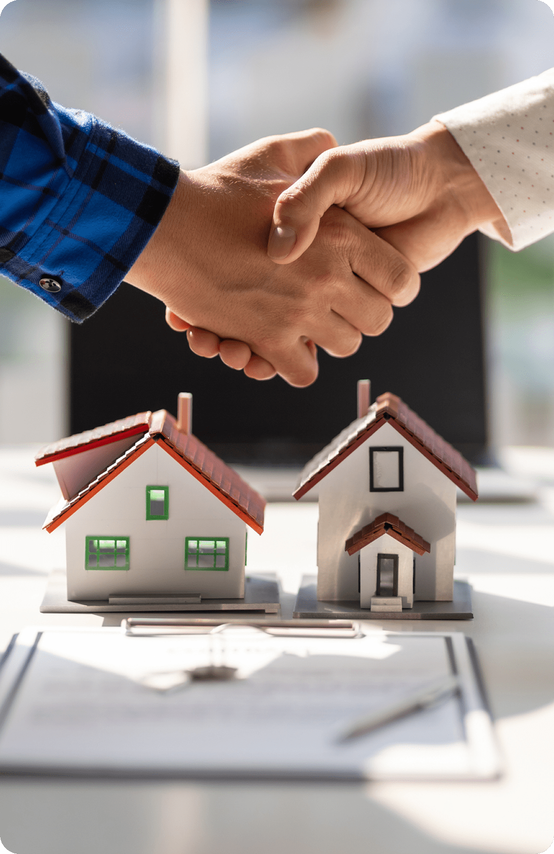 Real estate deal with handshake