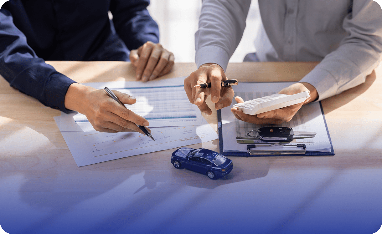 Hands exchanging car keys and paperwork