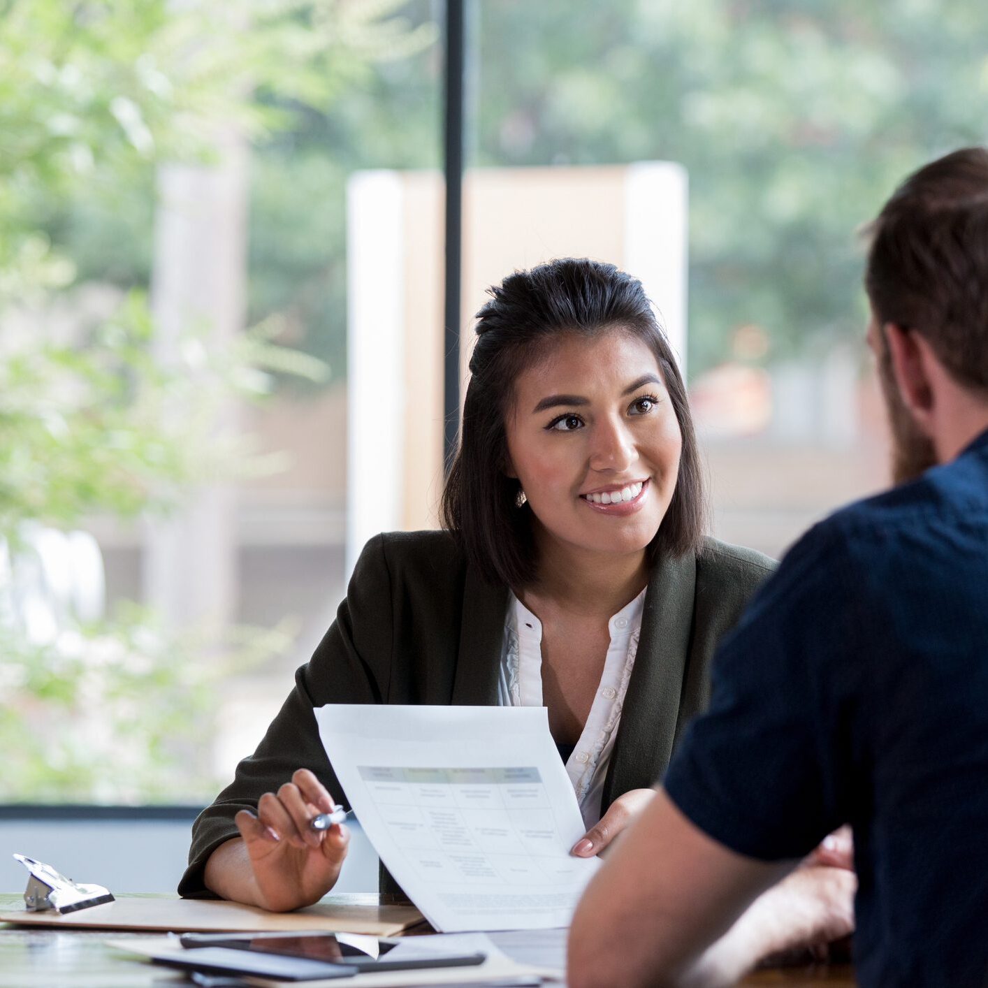 Two people in a business meeting